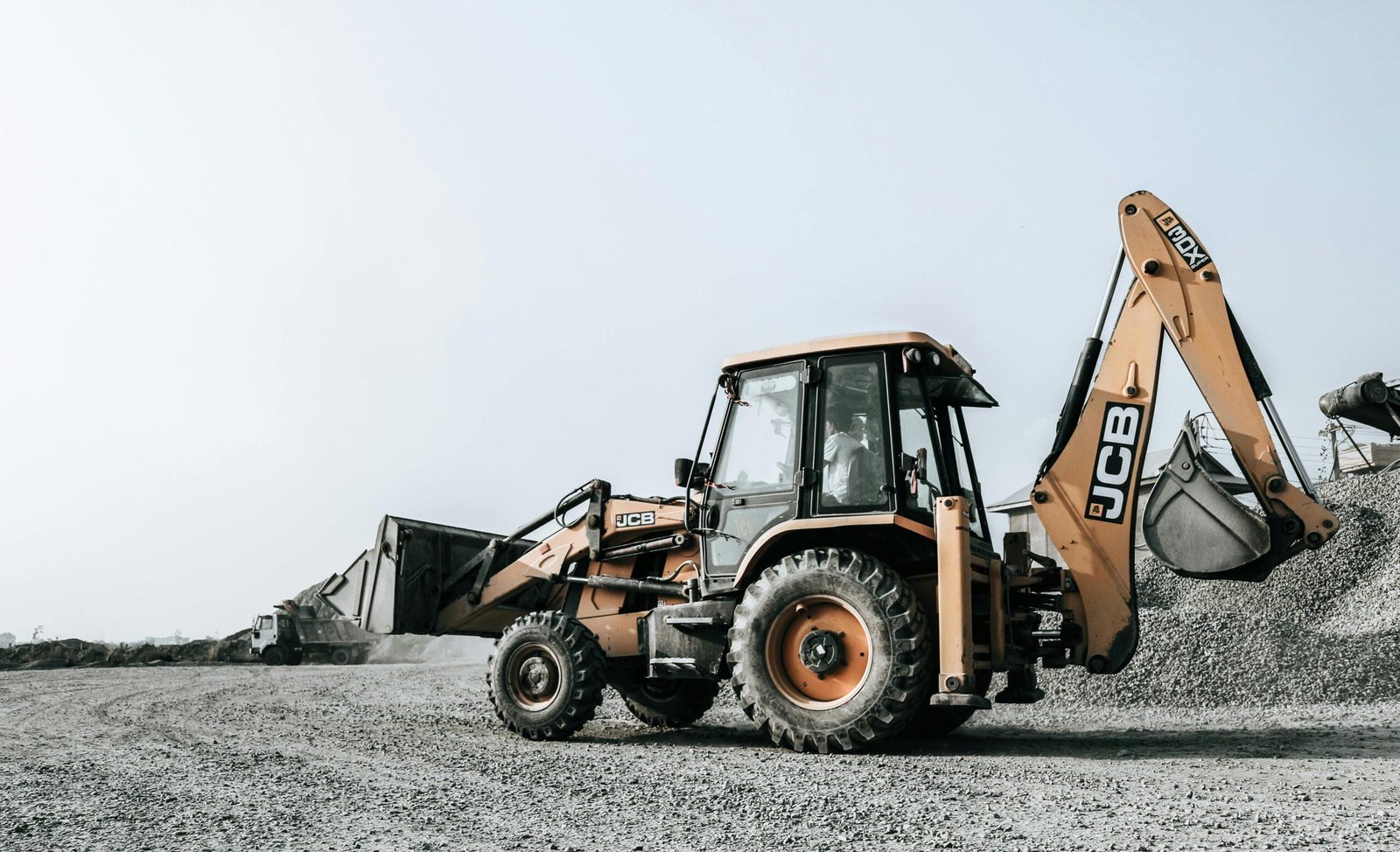 Excavator operating at a construction site in Nepal, capturing industrial machinery in action.