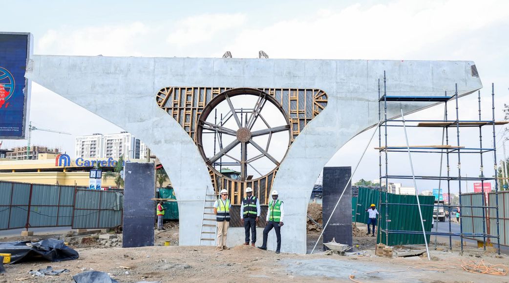 This is a photo of the construction team beside one of the elevated highway column structures. 