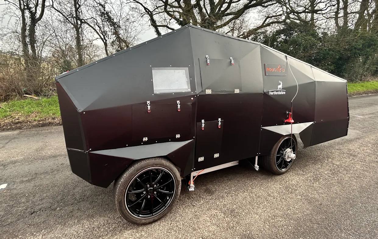 The AI pothole repair robot.